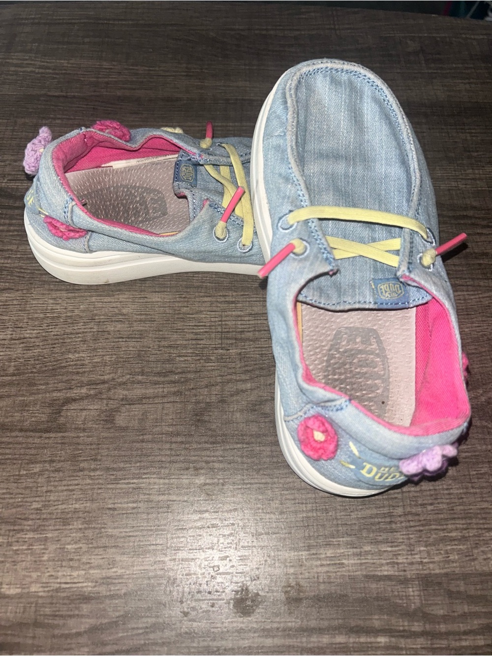 Hey Dude’s KIDS Denim Slip-On Sneakers with Pink Lining and Yellow Laces